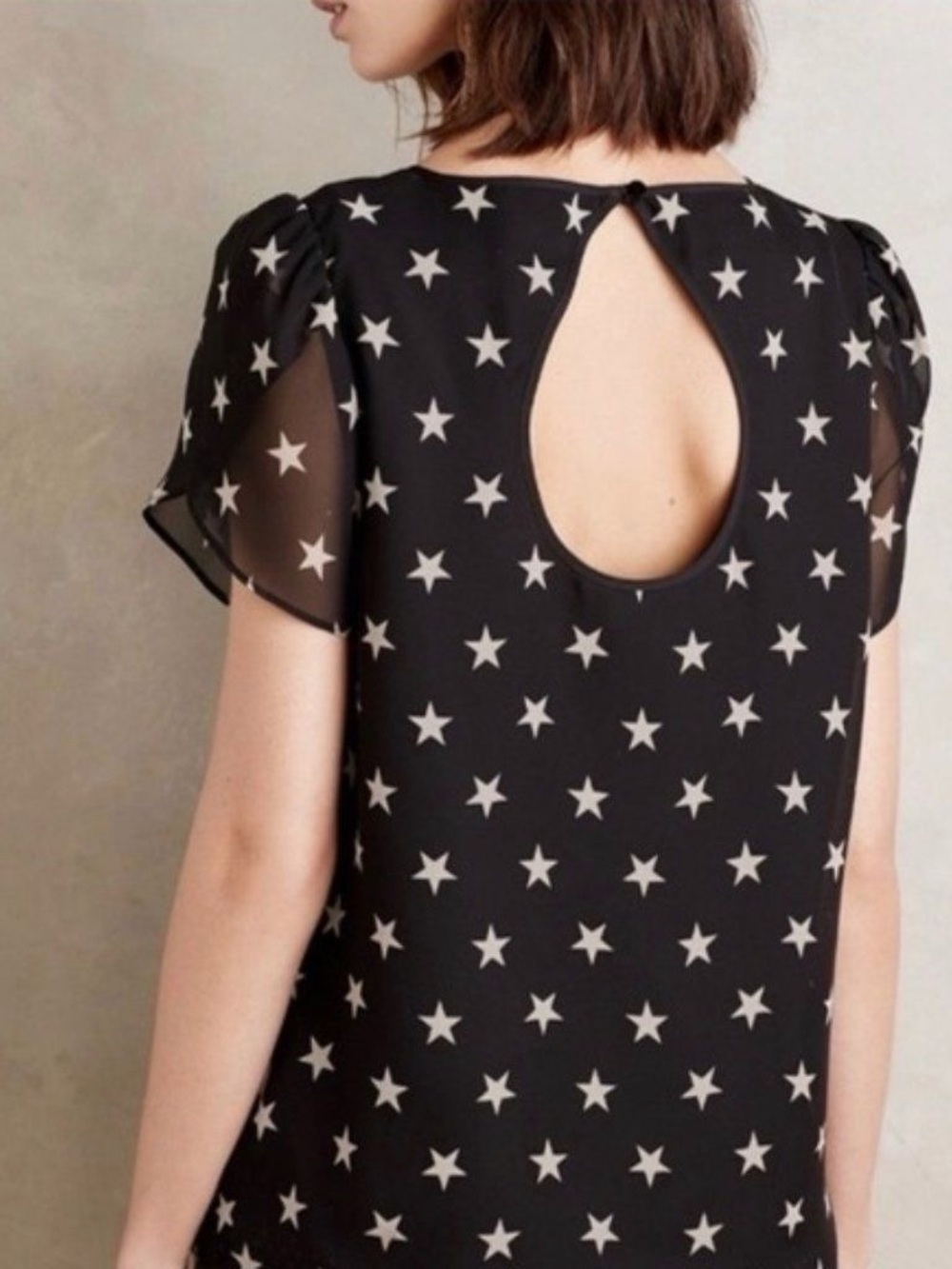 Anthropologie Black Starprint Short Sleeve Blouse